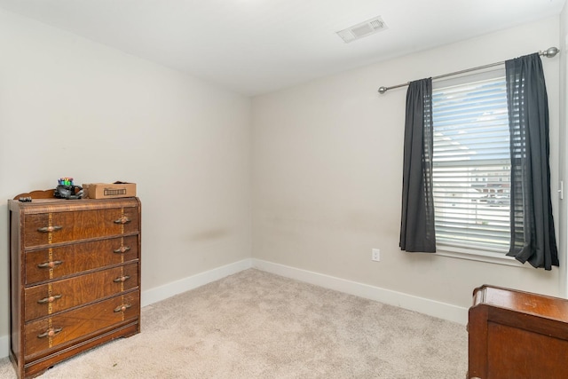 7025 Magnolia Crossings, Spring Hill, TN 37174 - bedroom with baseboards, light carpet, and visible vents
