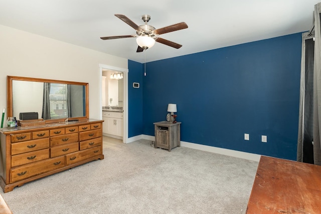 7025 Magnolia Crossings, Spring Hill, TN 37174 - bedroom featuring ensuite bath, light carpet, baseboards, and ceiling fan