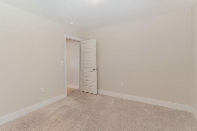 7025 Magnolia Crossings, Spring Hill, TN 37174 - empty room featuring light carpet and a smoke detector