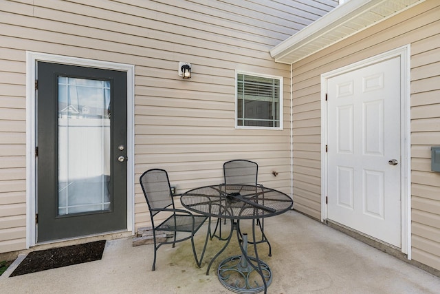 7025 Magnolia Crossings, Spring Hill, TN 37174 - entrance to property with outdoor dining space and a patio area