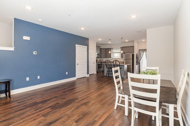 7025 Magnolia Crossings, Spring Hill, TN 37174 - dining space featuring dark wood-type flooring and recessed lighting