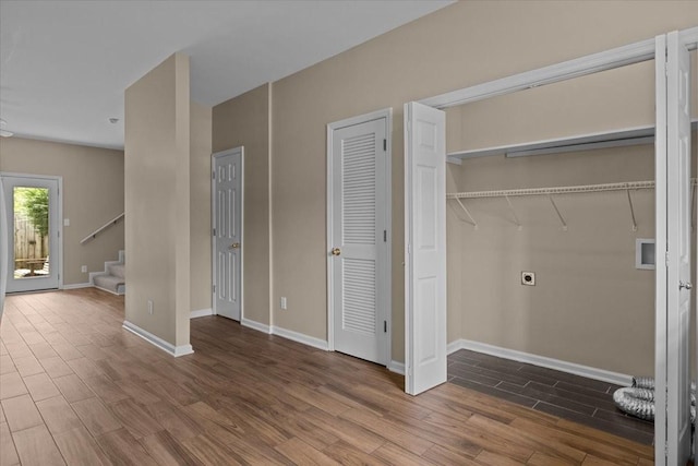 7203 Rosemary Ct, Fairview, TN 37062 - washroom with electric dryer hookup, laundry area, baseboards, and wood finished floors