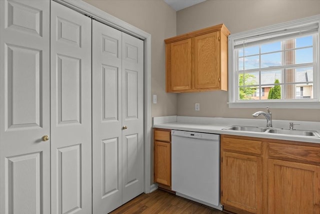 7203 Rosemary Ct, Fairview, TN 37062 - kitchen featuring white dishwasher, light countertops, a sink, and wood finished floors