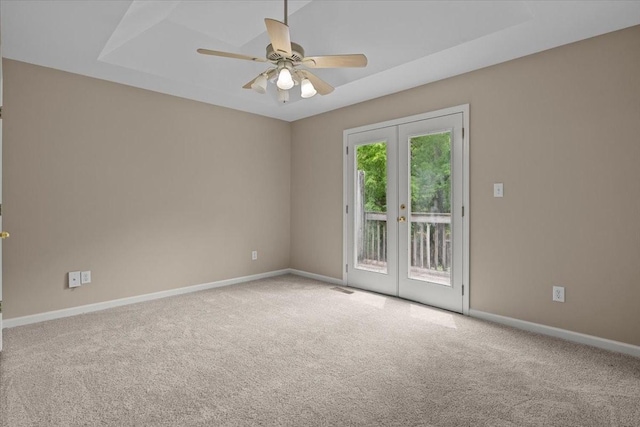 7203 Rosemary Ct, Fairview, TN 37062 - empty room featuring carpet floors, ceiling fan, baseboards, and french doors