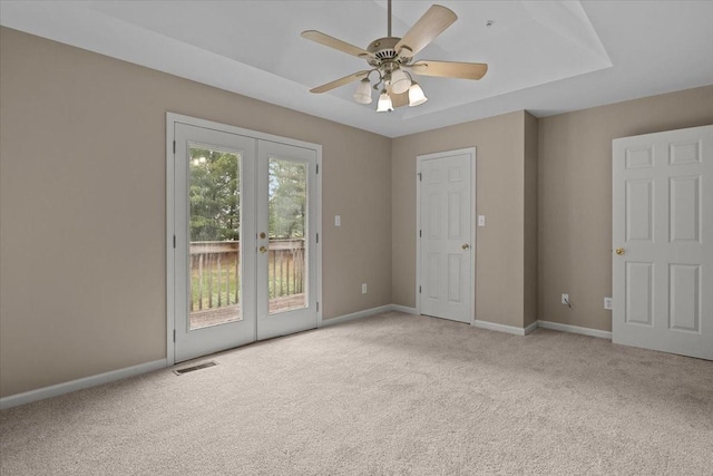 7203 Rosemary Ct, Fairview, TN 37062 - empty room featuring baseboards, visible vents, light carpet, and french doors