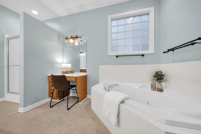 full bath with a jetted tub, a stall shower, vanity, baseboards, and tile patterned floors