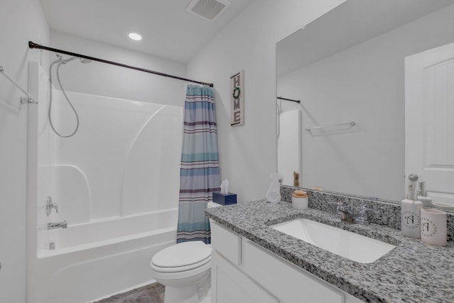 full bathroom featuring shower / tub combo with curtain, vanity, toilet, and visible vents