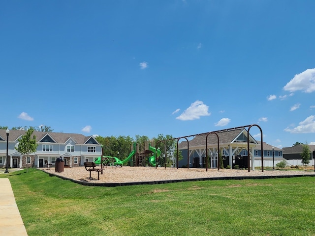 community play area featuring a lawn