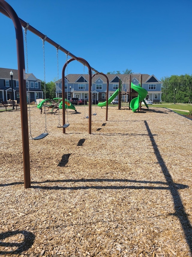 communal playground with a residential view