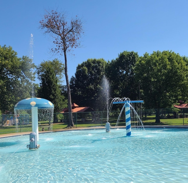 pool featuring fence