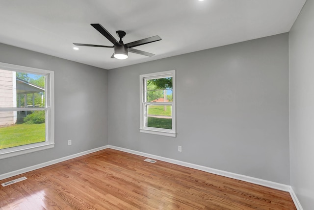 307 Franklin St, Cowan, TN 37318 - unfurnished room with plenty of natural light, baseboards, light wood-style floors, and recessed lighting