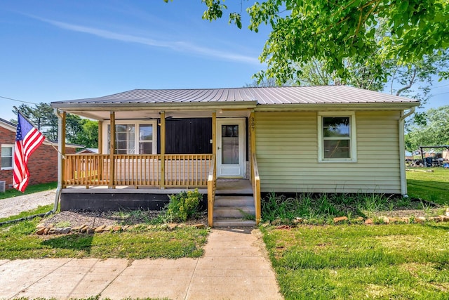 307 Franklin St, Cowan, TN 37318 - bungalow-style home featuring covered porch and metal roof
