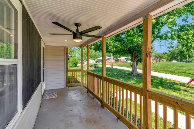 307 Franklin St, Cowan, TN 37318 - covered porch with a ceiling fan and a lawn