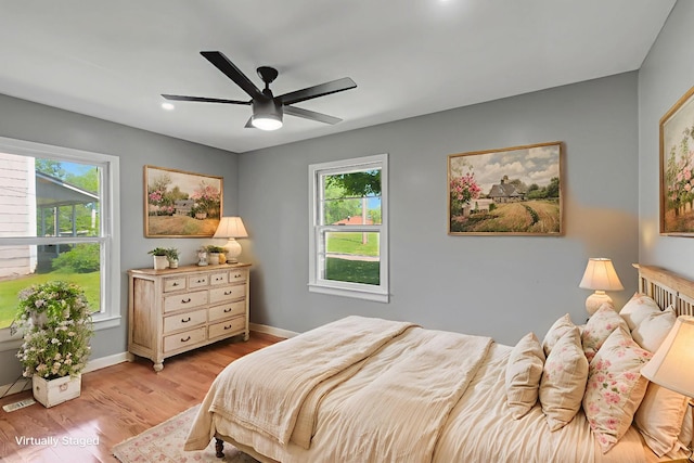 307 Franklin St, Cowan, TN 37318 - bedroom featuring light wood-style flooring, baseboards, ceiling fan, and recessed lighting