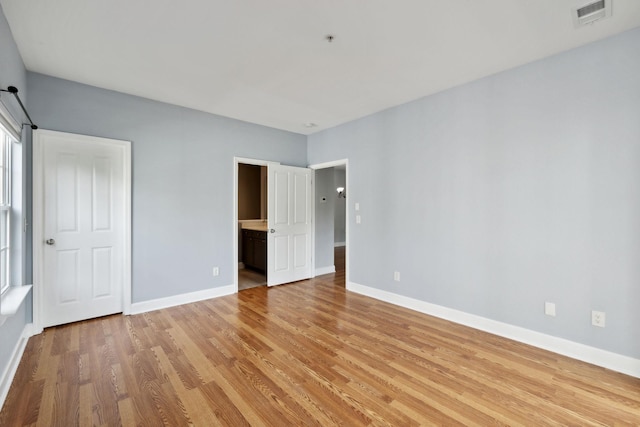 8231 Lenox Creekside Dr Unit C7, Antioch, TN 37013 - unfurnished bedroom with light wood-type flooring and baseboards