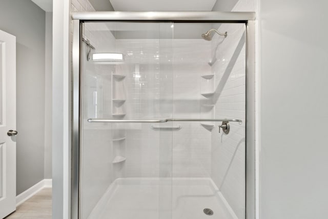 8231 Lenox Creekside Dr Unit C7, Antioch, TN 37013 - bathroom featuring a stall shower and baseboards