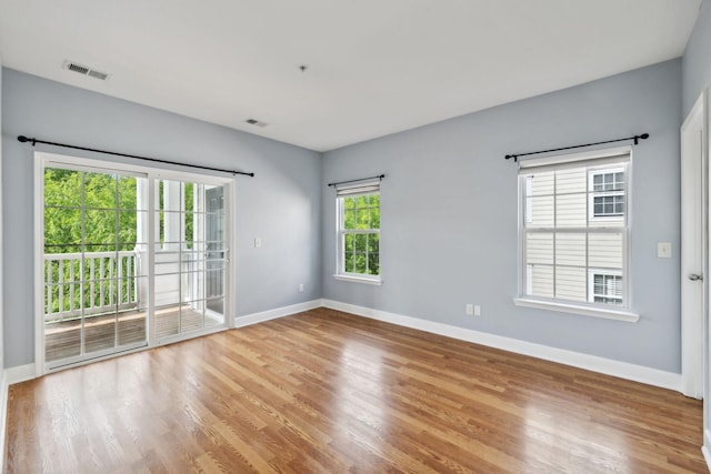8231 Lenox Creekside Dr Unit C7, Antioch, TN 37013 - spare room featuring baseboards and light wood-style flooring