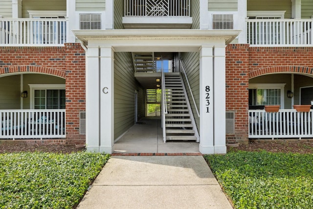 8231 Lenox Creekside Dr Unit C7, Antioch, TN 37013 - doorway to property with brick siding