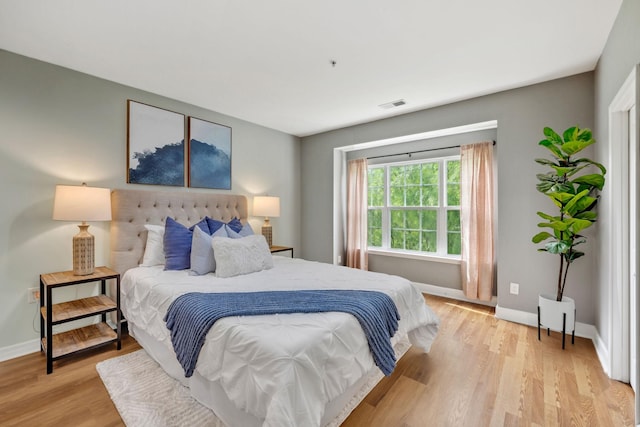 8231 Lenox Creekside Dr Unit C7, Antioch, TN 37013 - bedroom with baseboards and light wood-style floors