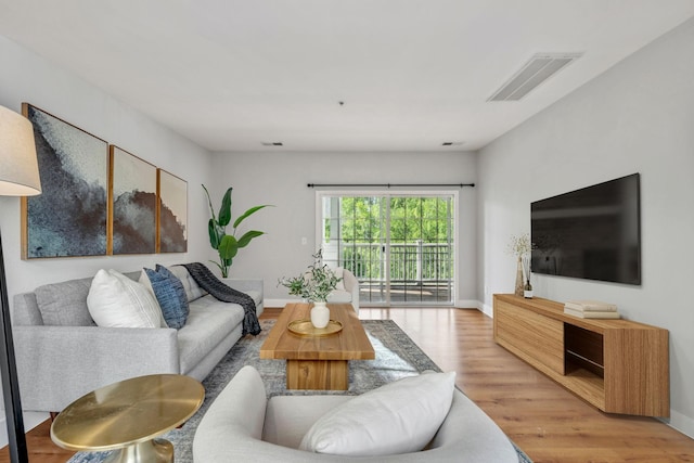 8231 Lenox Creekside Dr Unit C7, Antioch, TN 37013 - living room featuring light wood-style floors and baseboards