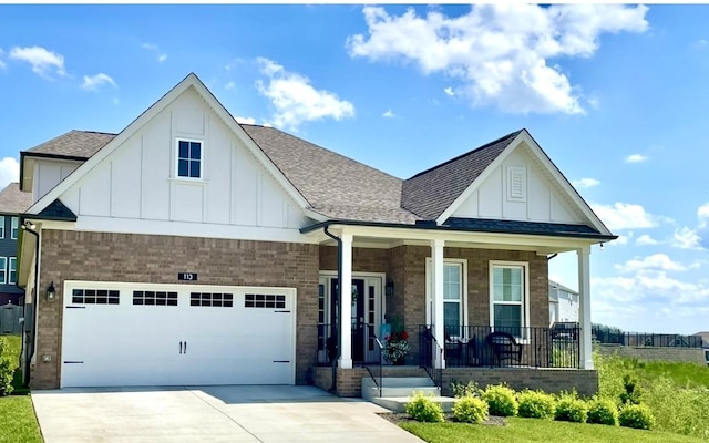 113 Cryer Dr, Gallatin, TN 37066 - view of front of property with board and batten siding, a shingled roof, and a porch