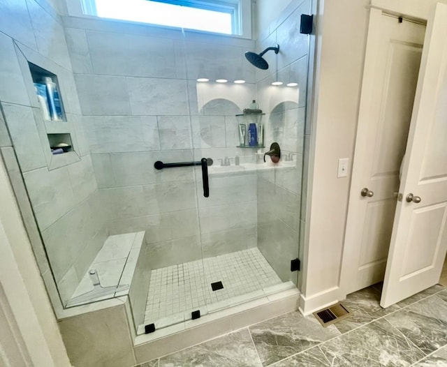 113 Cryer Dr, Gallatin, TN 37066 - full bathroom featuring baseboards, visible vents, a stall shower, and marble finish floor
