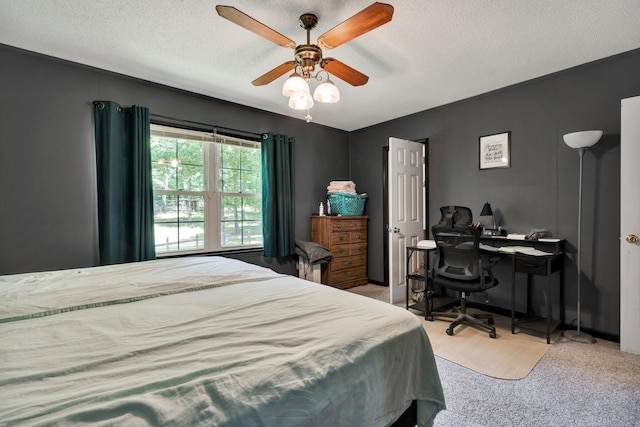 286 Pine Grove Rd, South Pittsburg, TN 37380 - carpeted bedroom featuring a textured ceiling and ceiling fan