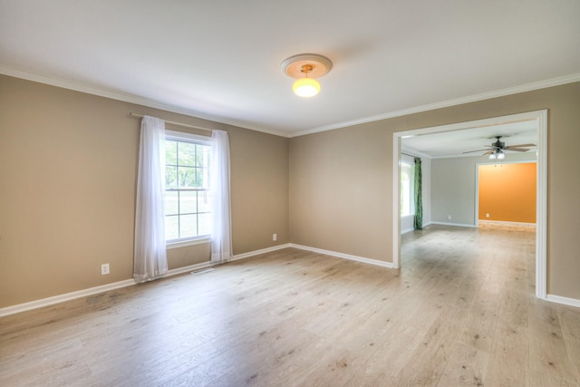 411 Willow Lake Dr, Portland, TN 37148 - spare room featuring crown molding, baseboards, and light wood-style floors