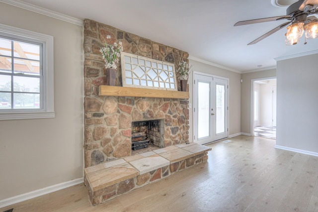 411 Willow Lake Dr, Portland, TN 37148 - unfurnished living room with a fireplace, a ceiling fan, baseboards, wood finished floors, and ornamental molding