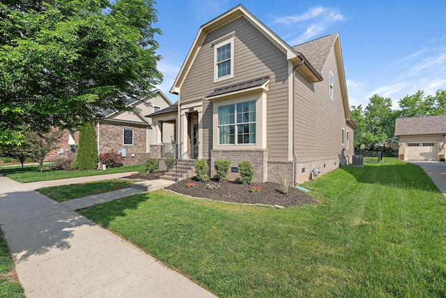 bungalow featuring central AC unit and a front lawn