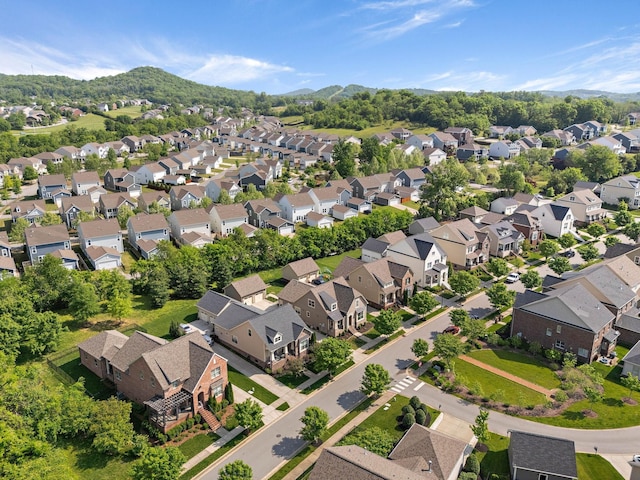 bird's eye view with a residential view and a mountain view