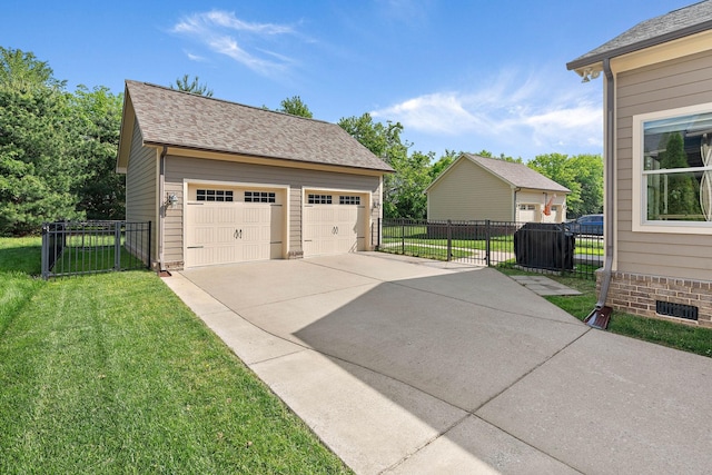 view of side of home with roof with shingles, a lawn, a garage, fence, and an outdoor structure