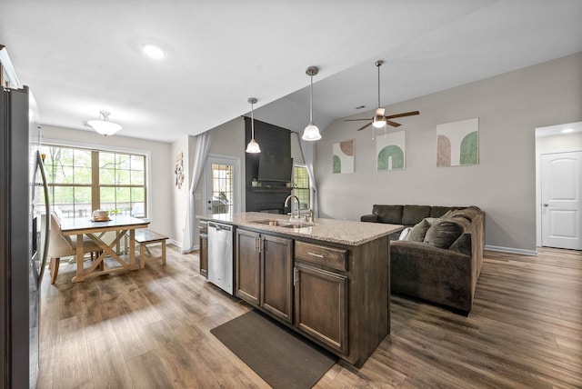757 Tidwell Dr, Clarksville, TN 37042 - kitchen featuring dark brown cabinets, appliances with stainless steel finishes, a sink, and dark wood finished floors