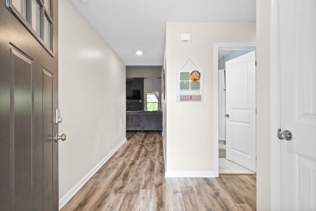 757 Tidwell Dr, Clarksville, TN 37042 - hallway with baseboards, recessed lighting, and wood finished floors