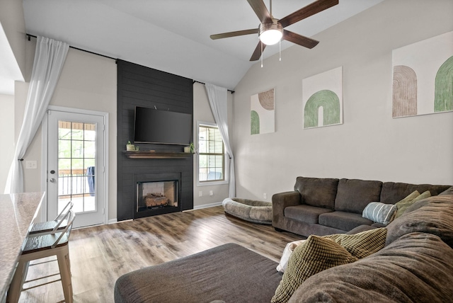 757 Tidwell Dr, Clarksville, TN 37042 - living area with a ceiling fan, a fireplace, wood finished floors, baseboards, and lofted ceiling