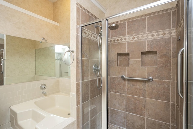 full bath featuring a shower stall and a bath