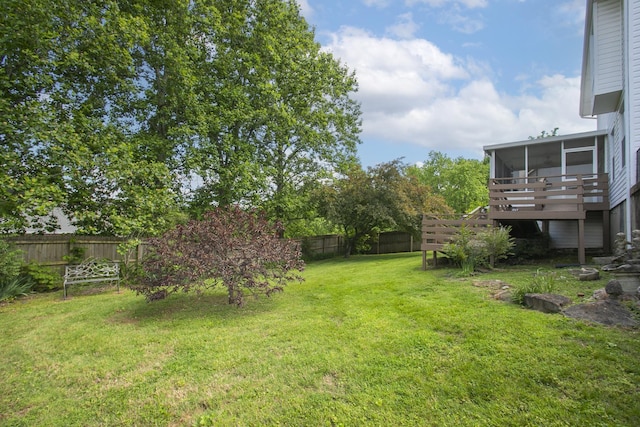 view of yard featuring a sunroom
