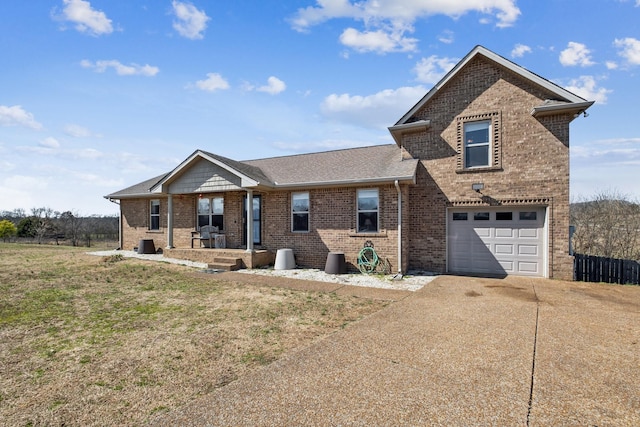 view of front of home featuring brick siding, an attached garage, roof with shingles, and driveway