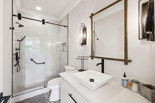 bathroom with vanity, toilet, recessed lighting, and a stall shower