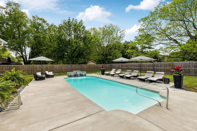 view of swimming pool with a fenced in pool, a fenced backyard, and a patio area