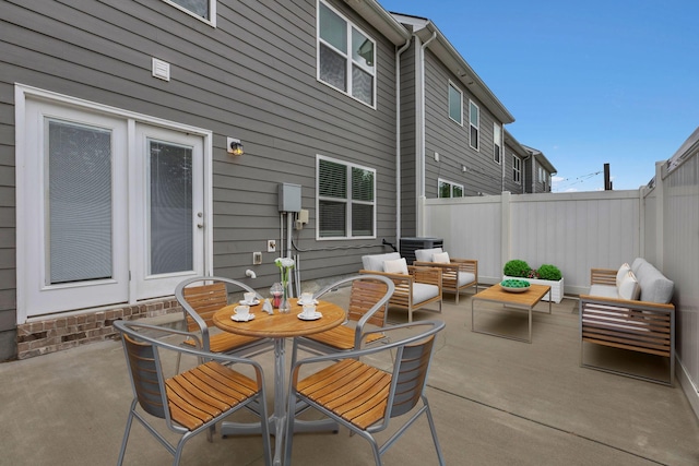 312 Mattie Ln, Spring Hill, TN 37174 - view of patio featuring an outdoor hangout area, a fenced backyard, and outdoor dining space