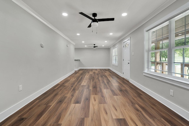 unfurnished room featuring ceiling fan, ornamental molding, recessed lighting, baseboards, and dark wood-style floors