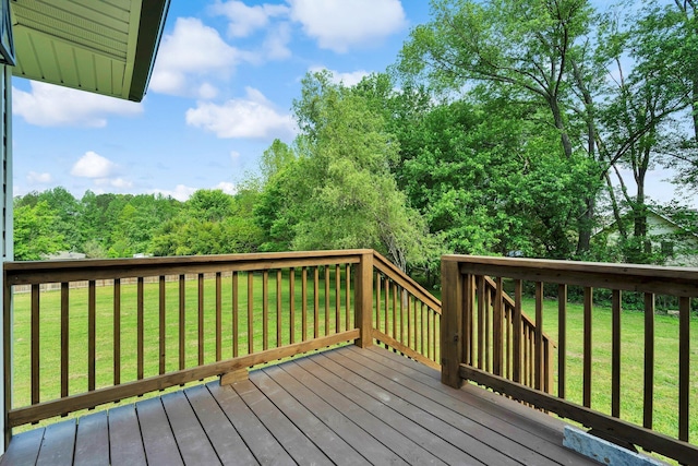 deck featuring a lawn