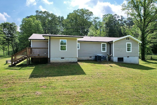 back of house featuring a wooden deck, central AC, stairs, crawl space, and a lawn