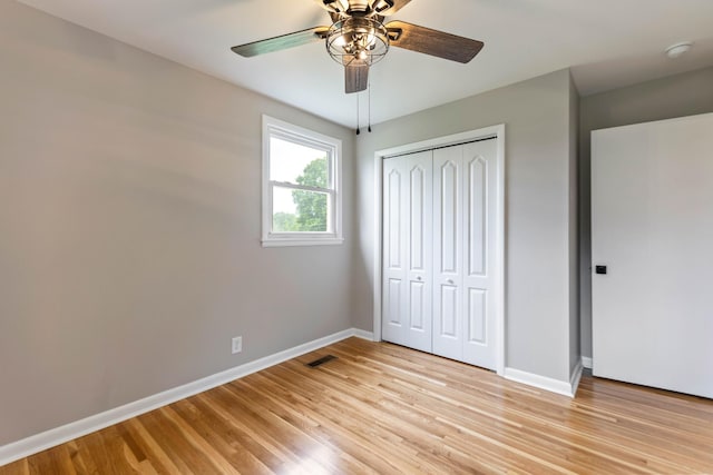 1025 Goshentown Rd, Hendersonville, TN 37075 - unfurnished bedroom with baseboards, light wood-type flooring, a closet, and ceiling fan