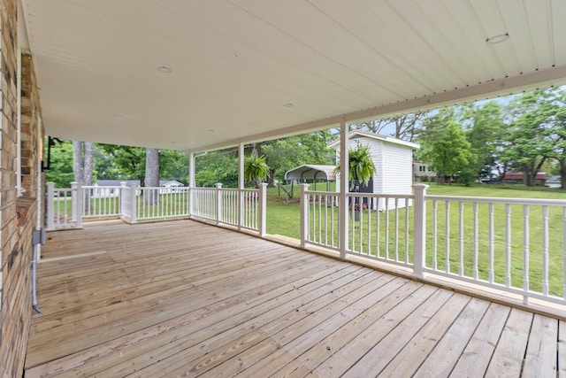 1025 Goshentown Rd, Hendersonville, TN 37075 - wooden terrace featuring a lawn and an outbuilding