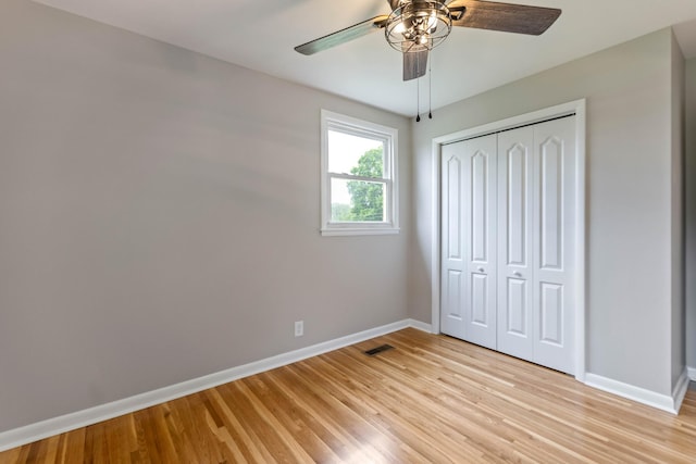 1025 Goshentown Rd, Hendersonville, TN 37075 - unfurnished bedroom with baseboards, light wood finished floors, a closet, and ceiling fan
