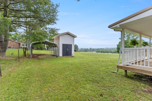 1025 Goshentown Rd, Hendersonville, TN 37075 - view of grassy yard featuring a detached carport and a deck