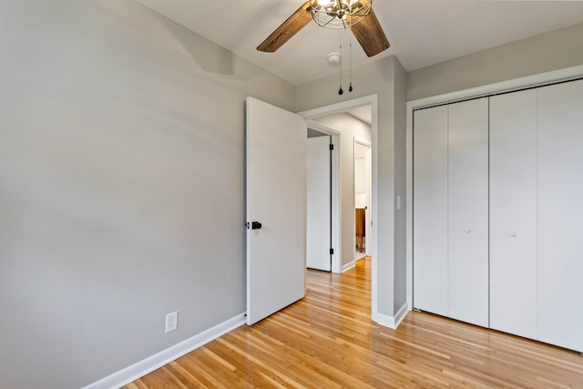 1025 Goshentown Rd, Hendersonville, TN 37075 - unfurnished bedroom featuring light wood-style floors, baseboards, a closet, and ceiling fan