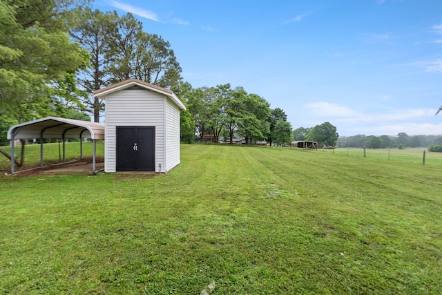 1025 Goshentown Rd, Hendersonville, TN 37075 - view of green lawn featuring a storage unit, a detached carport, and an outdoor structure